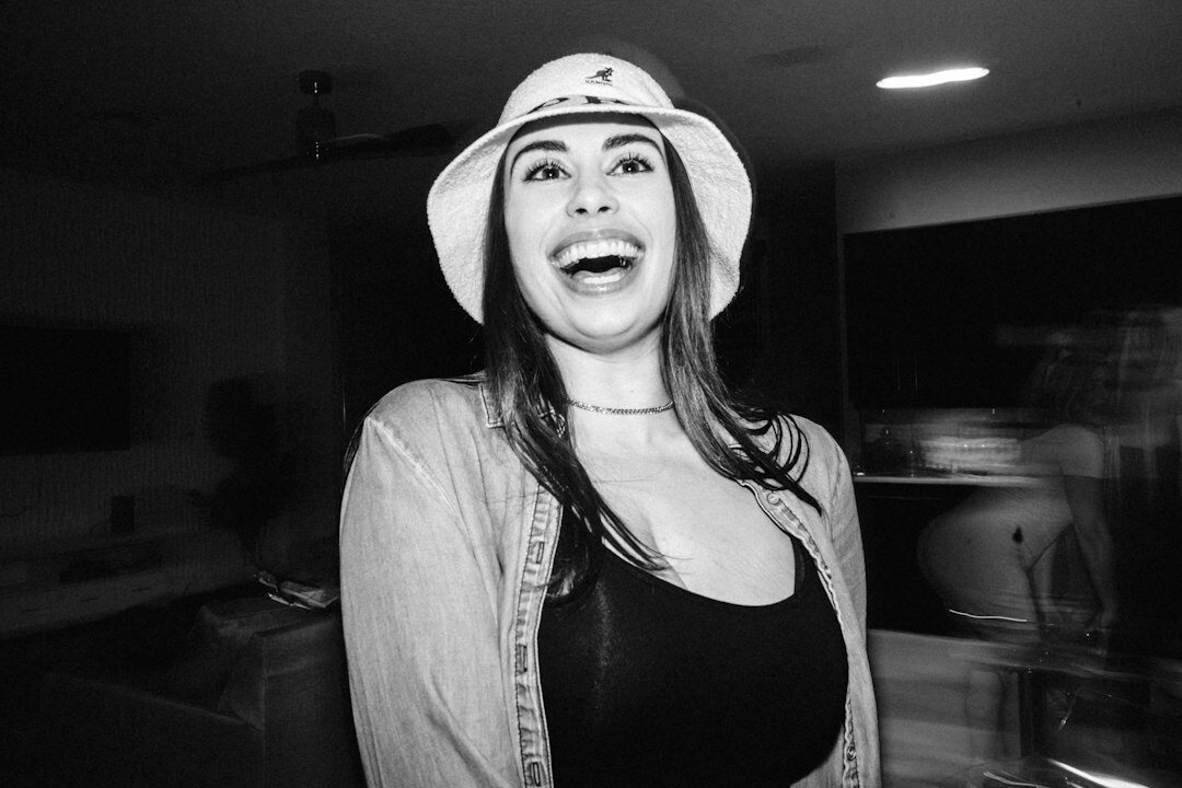 Portrait of a woman studio producer smiling